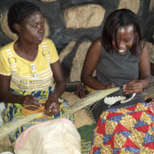 Rwandan basket weavers.  African basket weavers preserve their cultural heritage while they support themselves and their families.