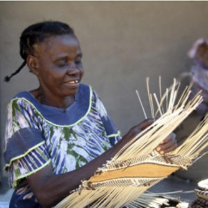 A Binga basket weaver in Zimbabwe.  African basket weavers preserve their cultural heritage while they support themselves and their families.