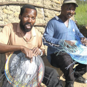 Zulu wire basket weavers.  African basket weavers preserve their cultural heritage while they support themselves and their families.